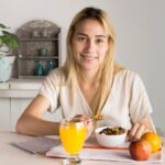 girl-having-healthy-breakfast_23-2147991112