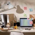 view-messy-office-workspace-with-laptop_23-2150282016