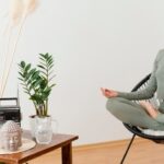 woman-meditating-home-chair_23-2148896087